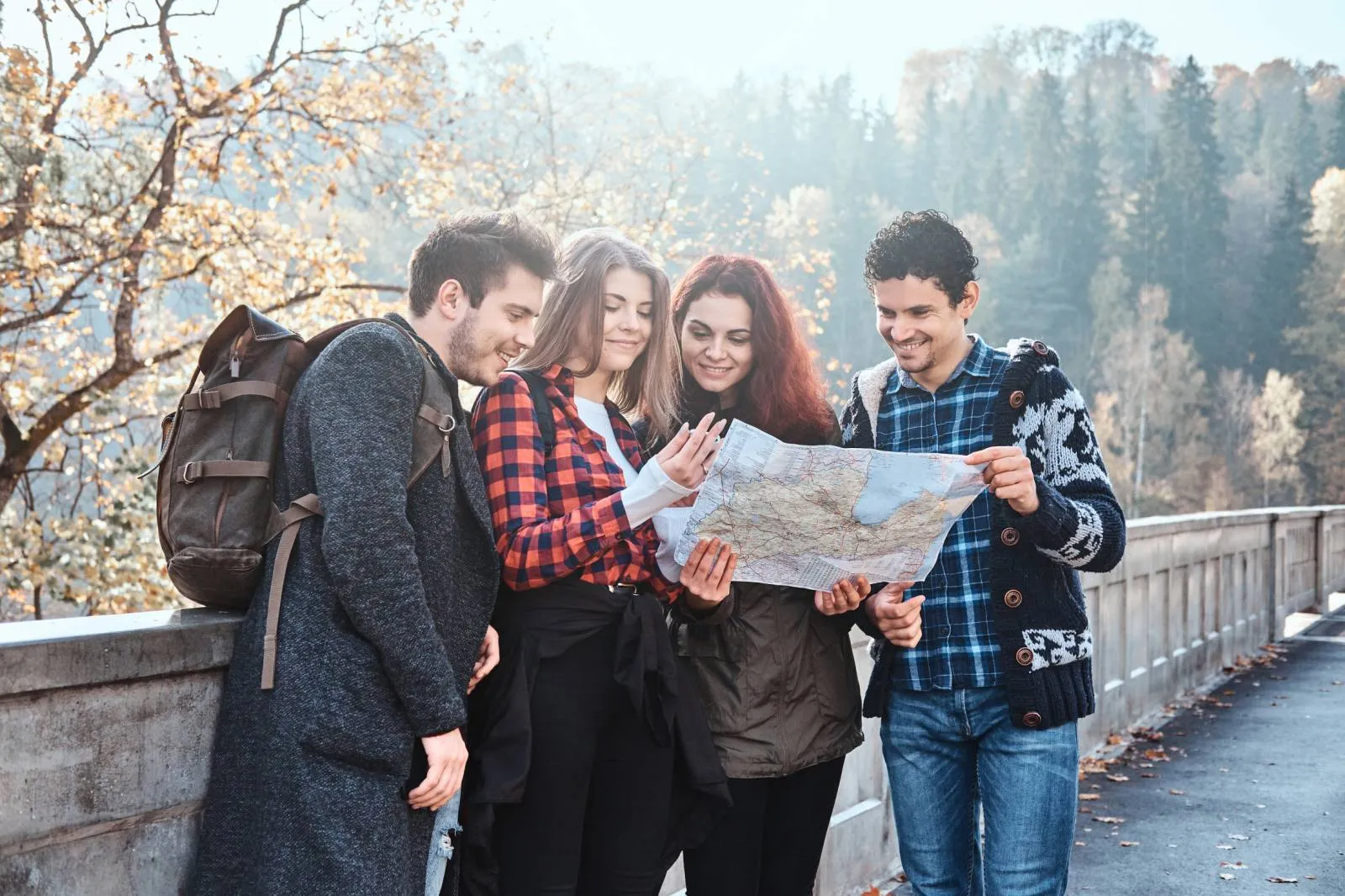 People looking at a map and smiling